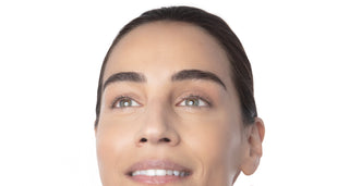 Woman taking care of her under eyes