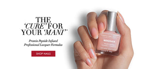 A hand holding a bottle of nail polish against a white background, with promotional text above reading 'THE CURE FOR YOUR MANI' and 'SHOP NAILS.' The nail polish appears to be a soft nude pink.