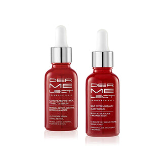 Two red serum bottles with silver caps on a white background